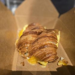 Dilena's Dolcini - Breakfast sandwich (fresh egg, cheese, peppered bacon) on Croissant