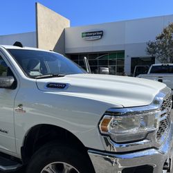 Enterprise Truck Rental - Returning the truck after a week, with my (now) repaired truck in the background. Irony, both RAMS