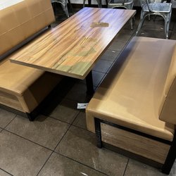 Powerade spilled all over the table and floor