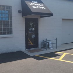Catholic Shoppe - Limited parking in front. This entrance is for large rear parking enter off Earlston Rd.