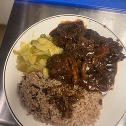 Panchos Kitchens - Oxtail rice & pea and cabbage meal