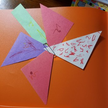 Mathnasium - Not really sure how taking precut shapes and connecting them with a paperclip teaches him math?  HE ALREADY KNOWS HIS SHAPES! - Tutoring Centers Near Me - Ann Arbor, Michigan