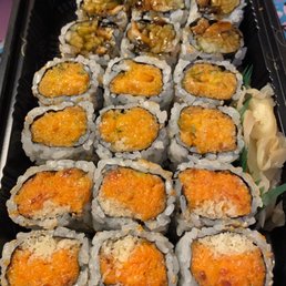 a tray of sushi rolls a tray of sushi rolls