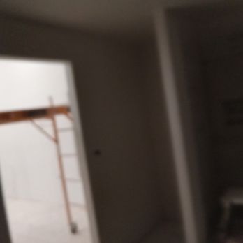 Morales Remodeling - an empty room with a ladder - General Contractors Near Me - Edinburg, Texas Morales Remodeling - an empty room with a ladder - General Contractors Near Me - Edinburg, Texas