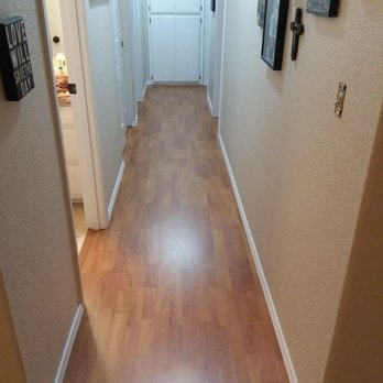 James Sherman Flooring - a hallway with a wood floor - Flooring Near Me