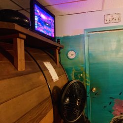 Tub House & Tanning - Cable and a fan