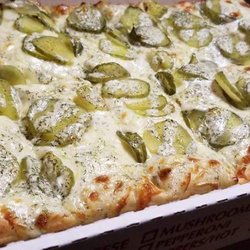 Ole Tyme Charley's Restaurant & Pub - Dill Pickle Ranch Pizza made with their housemade ranch dressing.