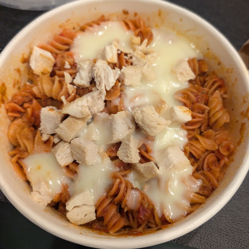Pastissimo - Medium Beet rotini w/ 3 meat sauce and added grilled chicken and mozzarella - Italian Near Me - Austin, Texas Pastissimo - Medium Beet rotini w/ 3 meat sauce and added grilled chicken and mozzarella - Italian Near Me - Austin, Texas