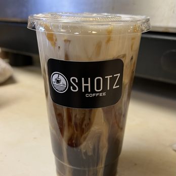Shotz Coffee - a cup of coffee on a counter - Coffee & Tea Near Me - Colfax, Washington Shotz Coffee - a cup of coffee on a counter - Coffee & Tea Near Me - Colfax, Washington