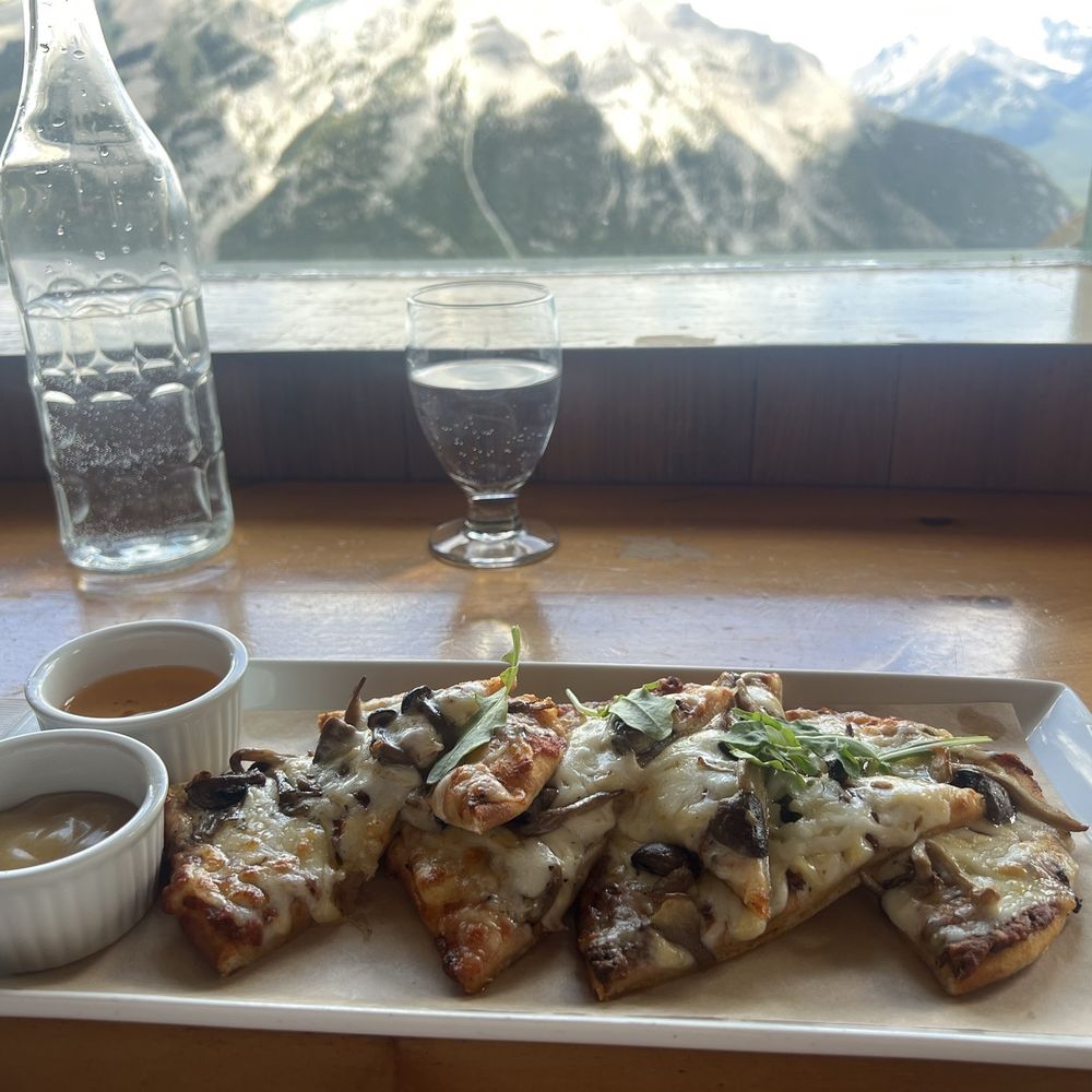Cliffhouse Bistro - Flatbread mushroom, heirloom flatbread with two dipping sauces on the side - Canadian (New) Near Me - Mount Norquay, Alberta Cliffhouse Bistro - Flatbread mushroom, heirloom flatbread with two dipping sauces on the side - Canadian (New) Near Me - Mount Norquay, Alberta