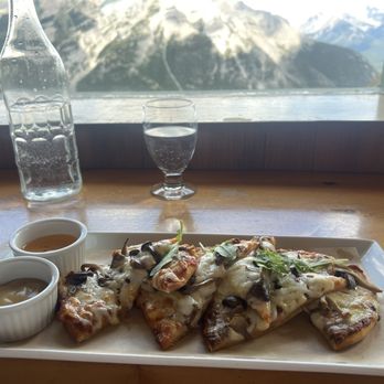Cliffhouse Bistro - Flatbread mushroom, heirloom flatbread with two dipping sauces on the side - Canadian (New) Near Me - Mount Norquay, Alberta Cliffhouse Bistro - Flatbread mushroom, heirloom flatbread with two dipping sauces on the side - Canadian (New) Near Me - Mount Norquay, Alberta