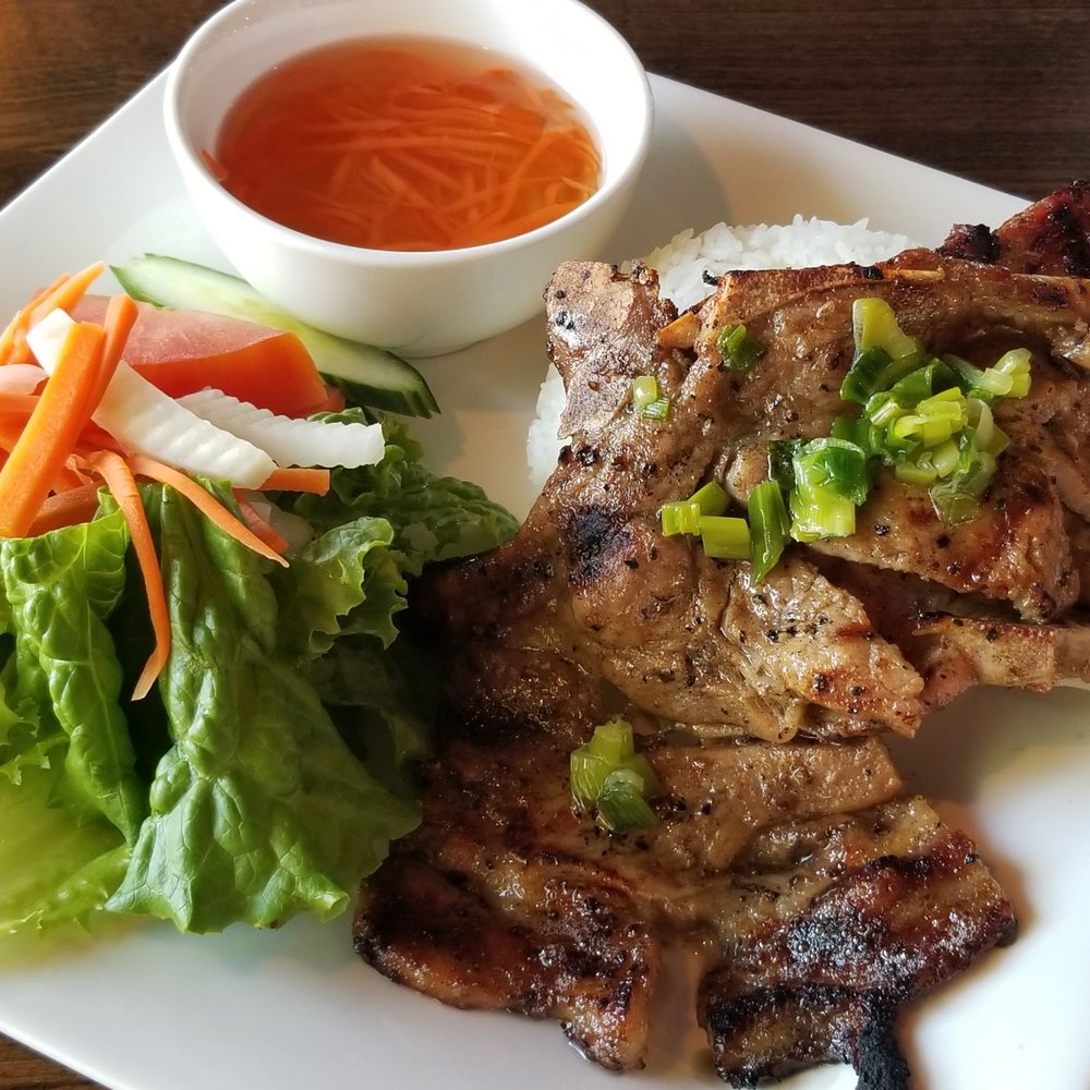Wicked Chopstix - Com soun Heo / Grilled Porkchop with rice $10. The pork so tender and juicy too. - Vietnamese Near Me - Seattle, Washington Wicked Chopstix - Com soun Heo / Grilled Porkchop with rice $10. The pork so tender and juicy too. - Vietnamese Near Me - Seattle, Washington