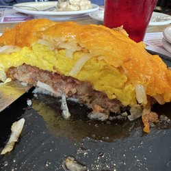 Rolly's Diner - Corned beef hash skillet (corned beef, eggs hash browns and cheese) soooo good!!!! With a grilled english muffin