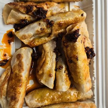 Super Taste - Fried dumpling with their soy vinegar and chili oil - Chinese Near Me - New York, New York Super Taste - Fried dumpling with their soy vinegar and chili oil - Chinese Near Me - New York, New York
