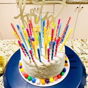 Moonlight Bakery - Plain White vanilla buttercream, exactly what we asked for so we could add our own topper. - Bakeries Near Me - Austin, Texas