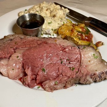 Casa De Pasta - Very Large prime rib. Cooked perfectly rare! With garlic mashed potatoes and vegetables. - Italian Near Me - Canandaigua, New York Casa De Pasta - Very Large prime rib. Cooked perfectly rare! With garlic mashed potatoes and vegetables. - Italian Near Me - Canandaigua, New York