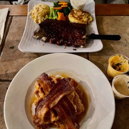 Crispy Chicken & Waffle with Bacon, Potato Pancakes & a Chipotle Maple Glaze & a Combo with a half rack rib & a crab cake. Crispy Chicken & Waffle with Bacon, Potato Pancakes & a Chipotle Maple Glaze & a Combo with a half rack rib & a crab cake.