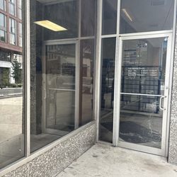 US Post Office - Door with posted hours