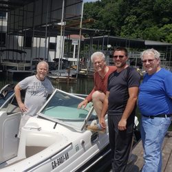 Chickamauga Lake Canvas & Upholstery - Left to right: founder is Pete, owner David, Neil steel & canvas, and Bob (retired) upholstery.