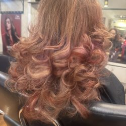 Winter warm colors with some highlights and a layered long cut.