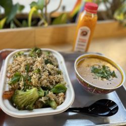 Pow Pow - Side of fried rice, bowl of thai pumpkin soup, and Natalie's Tangerine Juice