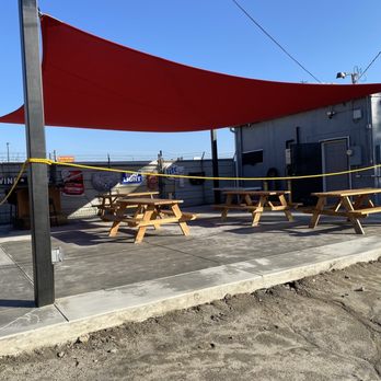 Dugans Beer & Wine - a picnic area with a red shade - Sports Wear Near Me - Bakersfield, California Dugans Beer & Wine - a picnic area with a red shade - Sports Wear Near Me - Bakersfield, California