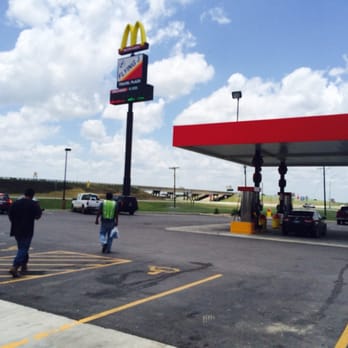 McDonald's - people walking in a parking lot - Burgers Near Me - George West, Texas