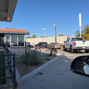 Swig - cars parked in a parking lot - Desserts Near Me - Mesa, Arizona Swig - cars parked in a parking lot - Desserts Near Me - Mesa, Arizona
