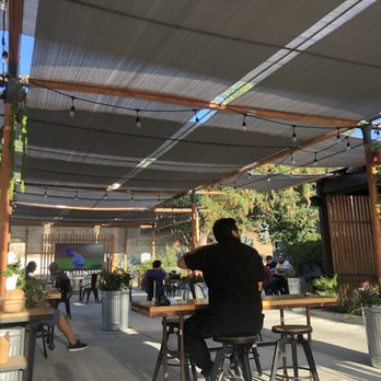 Brew Kitchen Bar - Outdoor seating. Looks great when it's lit up - Gastropubs Near Me - Monterey Park, California