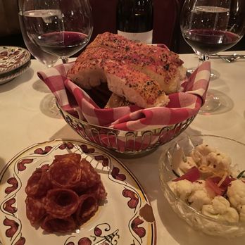 Carbone - Compliments ( Parmesan slices , salami , pickled cauliflower and bread ) - Italian Near Me - Las Vegas, Nevada
