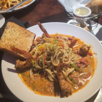 Aquarium Restaurant - Seafood rassta pasta with alligator sausage, crawfish , chicken , and shrimp - Seafood Near Me - Houston, Texas