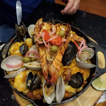 Gary's Restaurant & Bar - Meat and seafood paella! - Dominican Near Me - Lowell, Massachusetts Gary's Restaurant & Bar - Meat and seafood paella! - Dominican Near Me - Lowell, Massachusetts