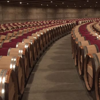 Opus One Winery - Opus One in barrels , beautiful! These barrels are colored/dyed using wine!! - Wineries Near Me - Oakville, California Opus One Winery - Opus One in barrels , beautiful! These barrels are colored/dyed using wine!! - Wineries Near Me - Oakville, California