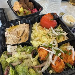 Chicken breast plate with a side of falafel