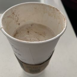 Uncovered my coffee to give it a quick stir and saw that a big portion was missing. Seems to be a common mistake at this location.