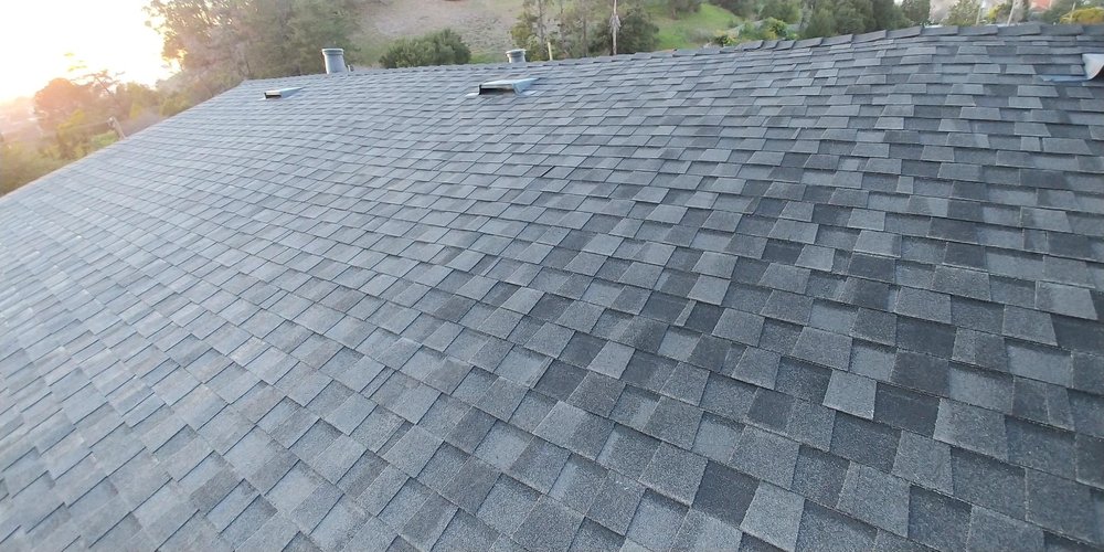 Slide of T D Roofing