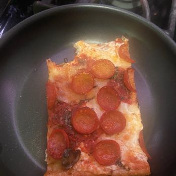 Nonno's Pizza - Pepperoni square w/ one bite of - Pizza Near Me - Brooklyn, New York Nonno's Pizza - Pepperoni square w/ one bite of - Pizza Near Me - Brooklyn, New York