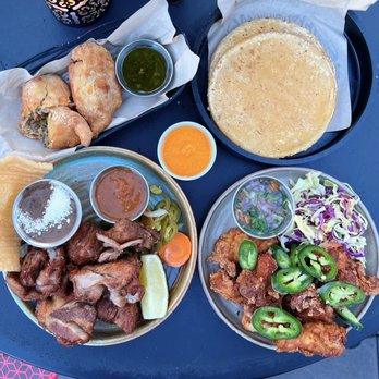 El Techo - Empanadas de Carne (HH-$7/Reg.-$10), Pollo Frito (HH-$7/Reg.-$14), 1/2 lb Chicharrones de Carne w/ handmade tortillas ($24) - Latin American Near Me - San Francisco, California