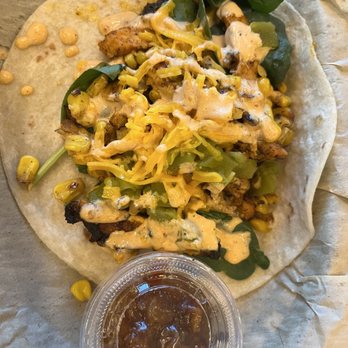 Torchy's Tacos - Tipsy Chick... GRILLED CHICKEN, SPINACH, GRILLED CORN, GREEN CHILES & CHEDDAR CHEESE...SERVED WITH A SIDE OF BACON BOURBON MARMALADE. - Tex-Mex Near Me - Raleigh, North Carolina Torchy's Tacos - Tipsy Chick... GRILLED CHICKEN, SPINACH, GRILLED CORN, GREEN CHILES & CHEDDAR CHEESE...SERVED WITH A SIDE OF BACON BOURBON MARMALADE. - Tex-Mex Near Me - Raleigh, North Carolina