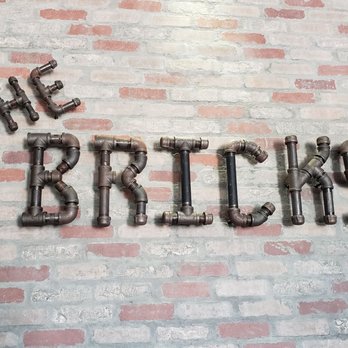 The Bricks - Love the steam punk like sign and other decor. - Pizza Near Me - Olsburg, Kansas The Bricks - Love the steam punk like sign and other decor. - Pizza Near Me - Olsburg, Kansas