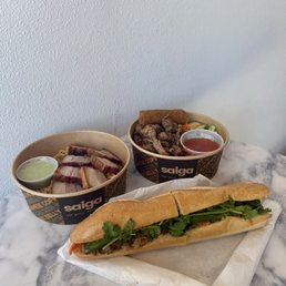 Grilled pork banh mi, grilled pork vermicelli, and pork belly garlic noodles