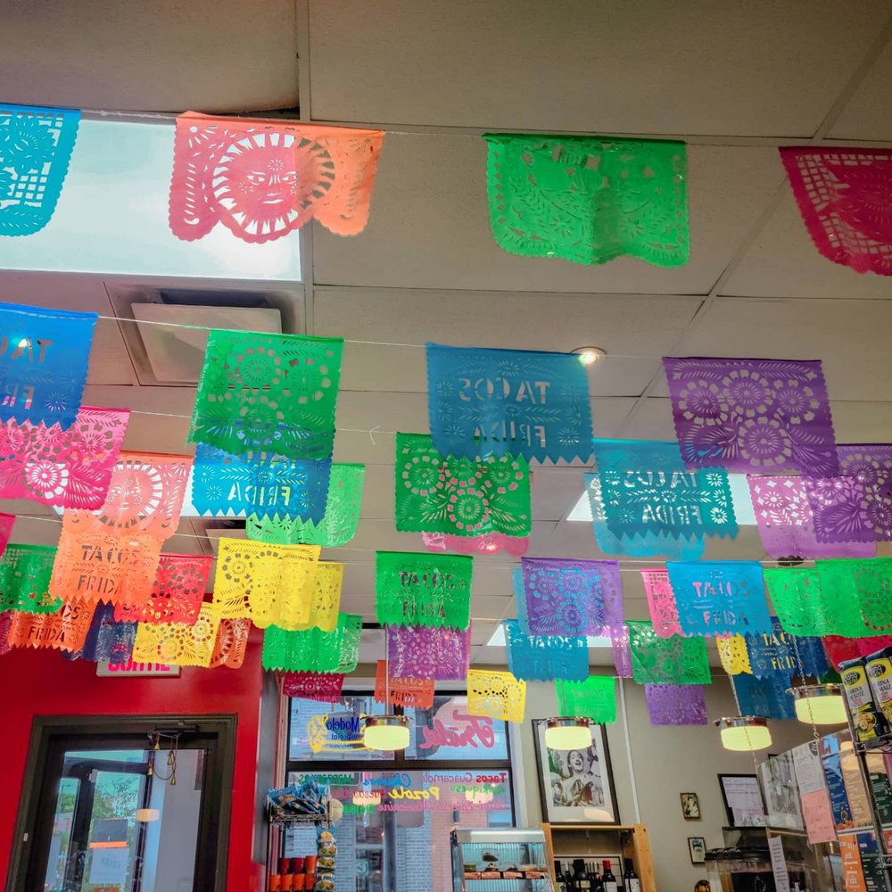 Tacos Frida - a colorful display of mexican flags - Mexican Near Me - Montreal, Quebec Tacos Frida - a colorful display of mexican flags - Mexican Near Me - Montreal, Quebec