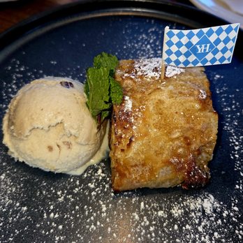 Yard House - TRADITIONAL APPLE STRUDEL  -- Warm pastry * Diced apples * Butter-pecan ice cream * Crème anglaise * Honey mustard. - New American Near Me - Irvine, California