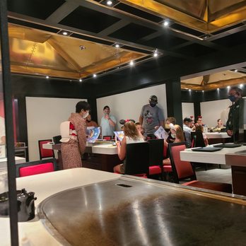 Teppan Edo - a group of people in a restaurant - Japanese Near Me - Lake Buena Vista, Florida Teppan Edo - a group of people in a restaurant - Japanese Near Me - Lake Buena Vista, Florida