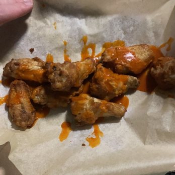 Domino's Pizza - a person holding a tray of chicken wings - Pizza Near Me - Springboro, Ohio Domino's Pizza - a person holding a tray of chicken wings - Pizza Near Me - Springboro, Ohio