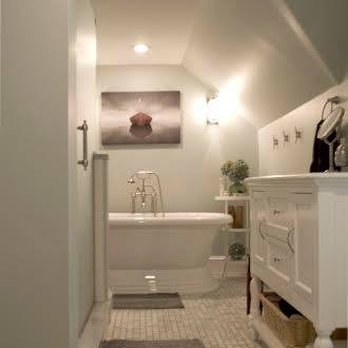 Casa Pro Builders - a bathroom with a bathtub and a sink - General Contractors Near Me