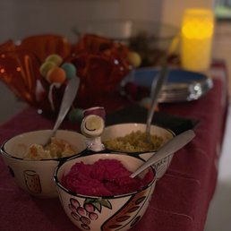 Hummus trio appetizer with fresh pita - the California beet hummus was our fave! Hummus trio appetizer with fresh pita - the California beet hummus was our fave!