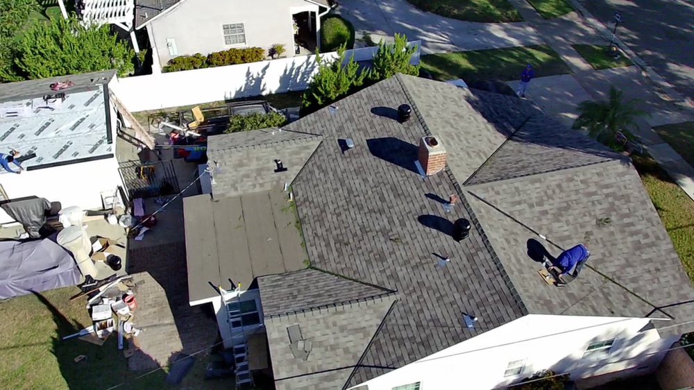 Slide of OC Roof Contractors