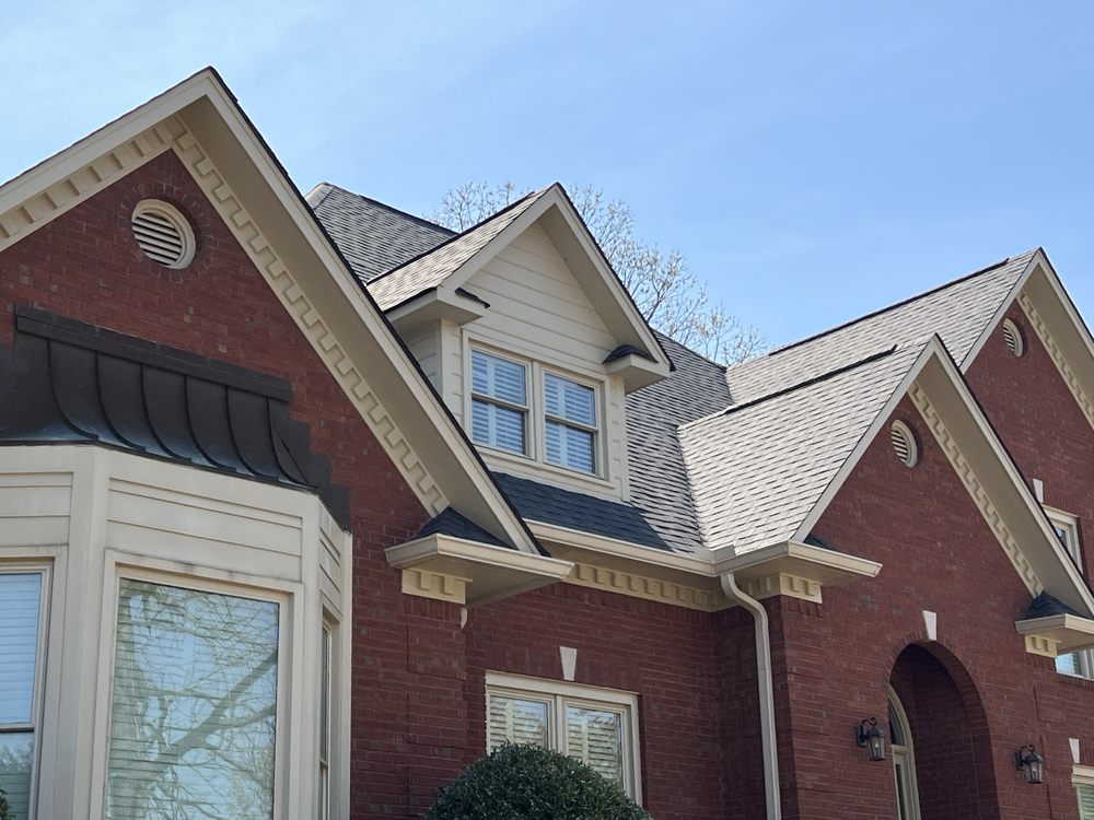 Slide of Capstone Roofing