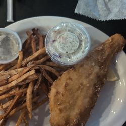 Beer battered cod with fresh cut fries and homemade coleslaw and tartar sauce